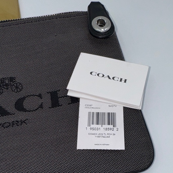 Coach Charcoal Twist lock Clutch with 1941 Hang Tag